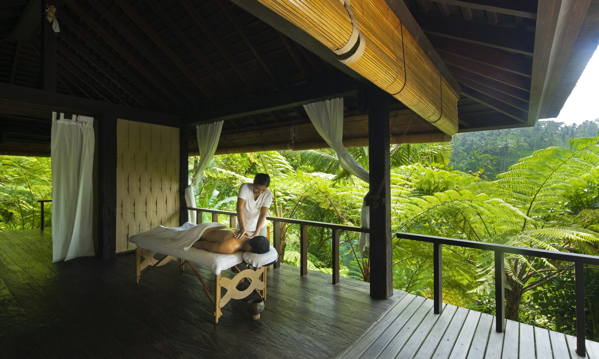 Massage treatment in an open-air pavilion overlooking the jungle at Como Shambhala Estate