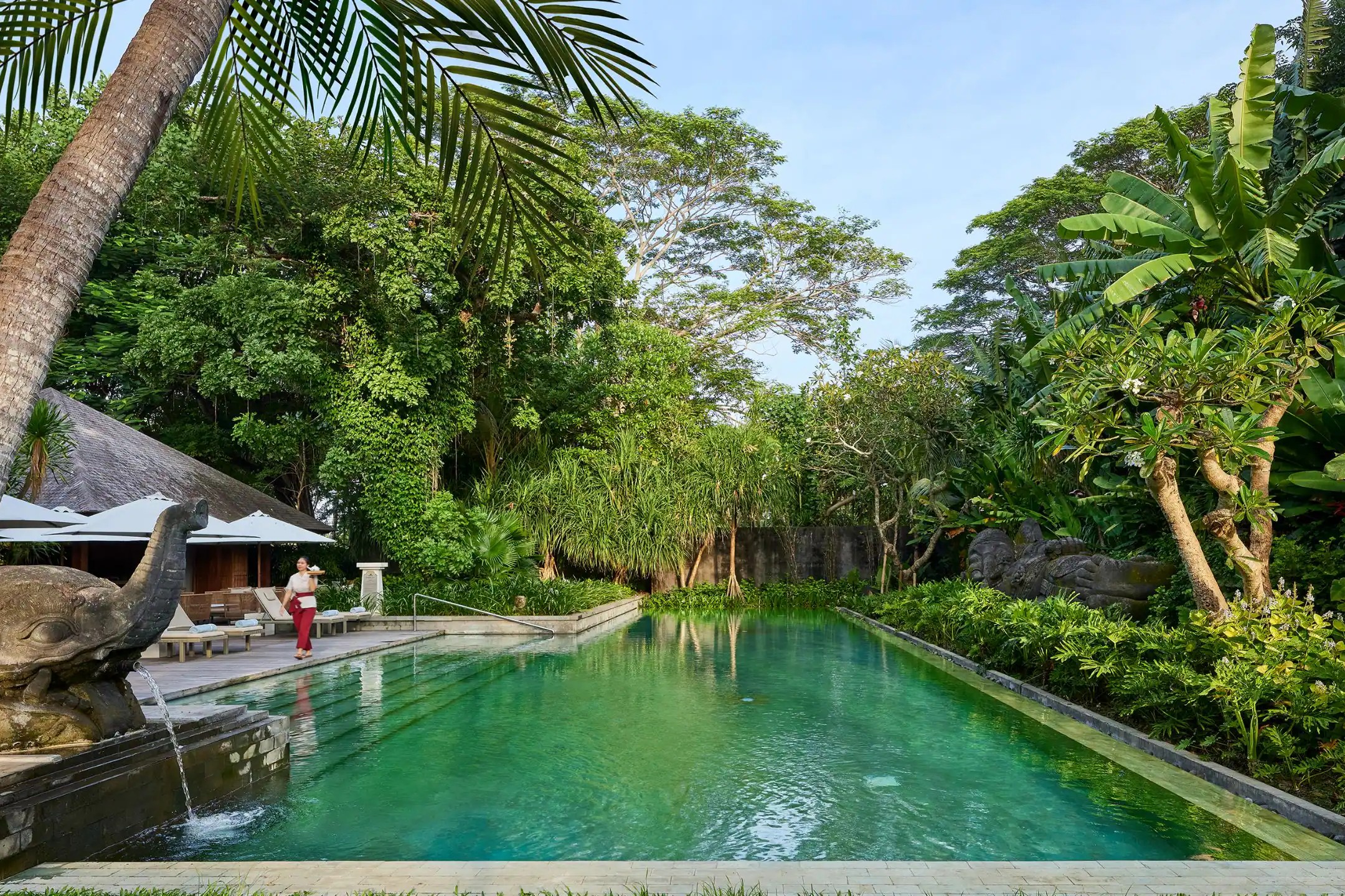 One of several small pools at Hyatt Regency Bali, screened off by dense garden planting