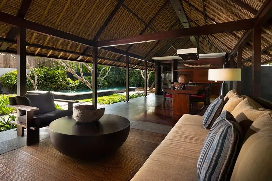 The open-air living pavilion of a villa at Kayumanis Jimbaran, overlooking the private pool