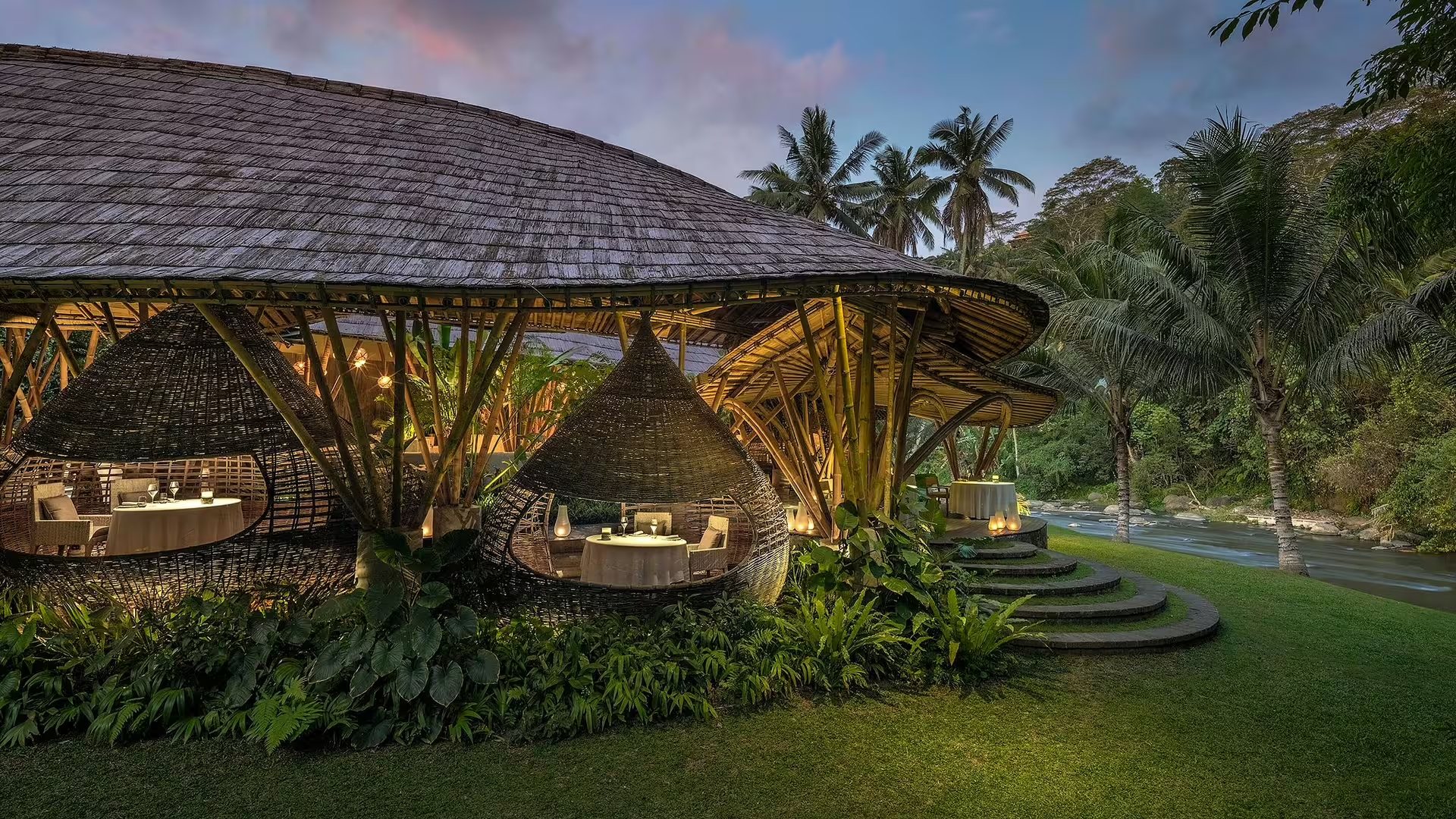 The main pool at Mandapa, a Ritz-Carlton Reserve, framed by jungle and rice terraces