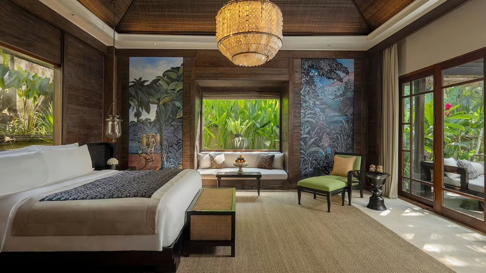 Reserve Suite interior at Mandapa, a Ritz-Carlton Reserve, with hand-painted panels and jungle views