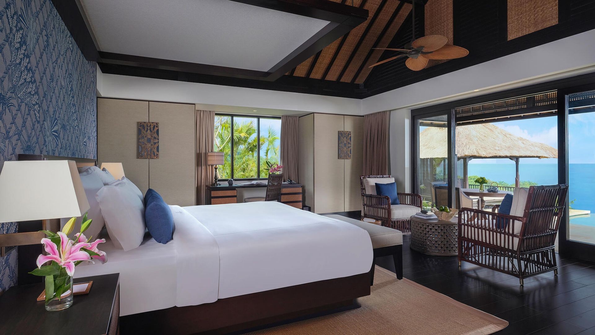 A villa bedroom at The Raffles Bali, opening onto the ocean view