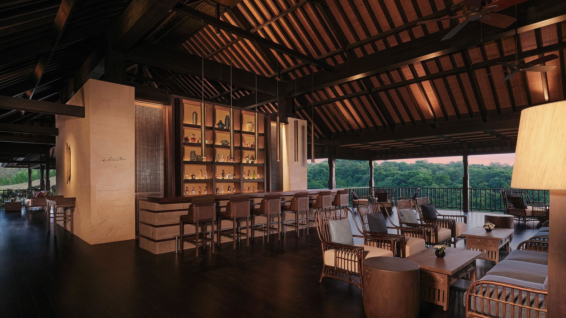 The Writers Bar at The Raffles Bali, overlooking the jungle at dusk